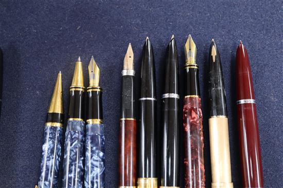 A collection of assorted Parker and other fountain and ballpoint pens and pencils